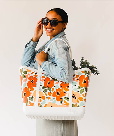 http://sleepythicket.com/cdn/shop/products/CarryItAllTote-WhiteFloral3_1024x1024.png?v=1660160687